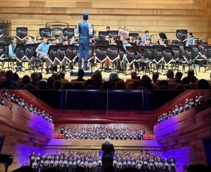 On stage School band in top half and choir in bottom half of photo
